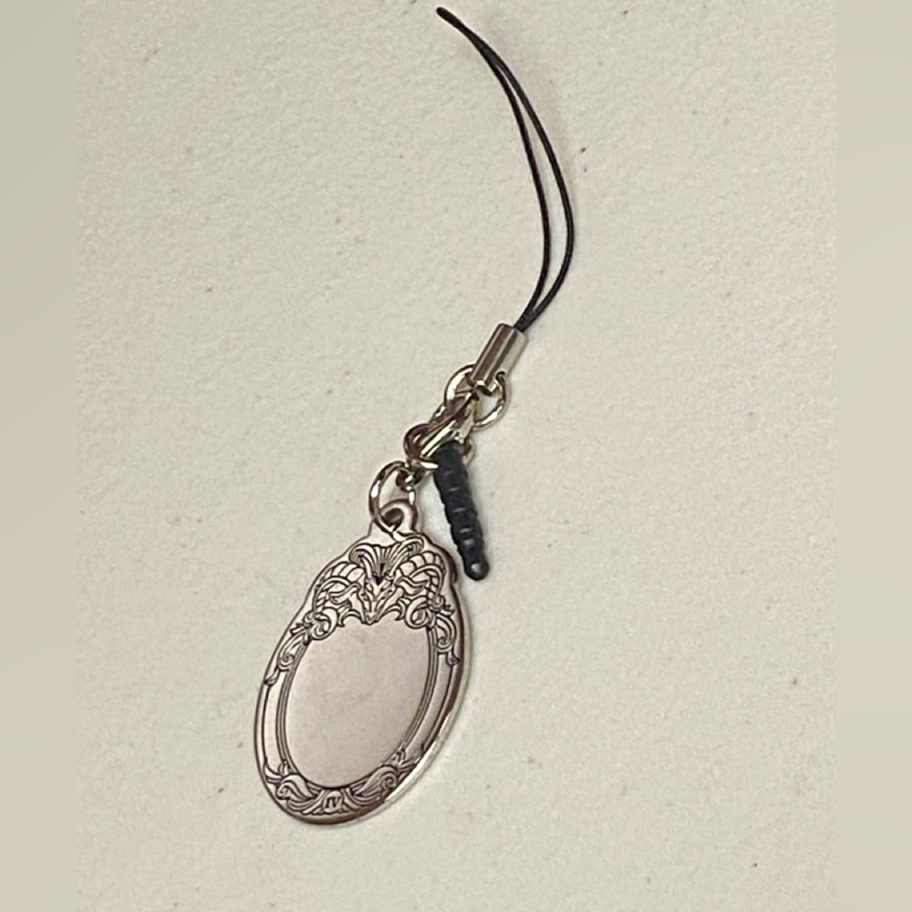 Loot Anime silver metal haunted mirror hanging for phone